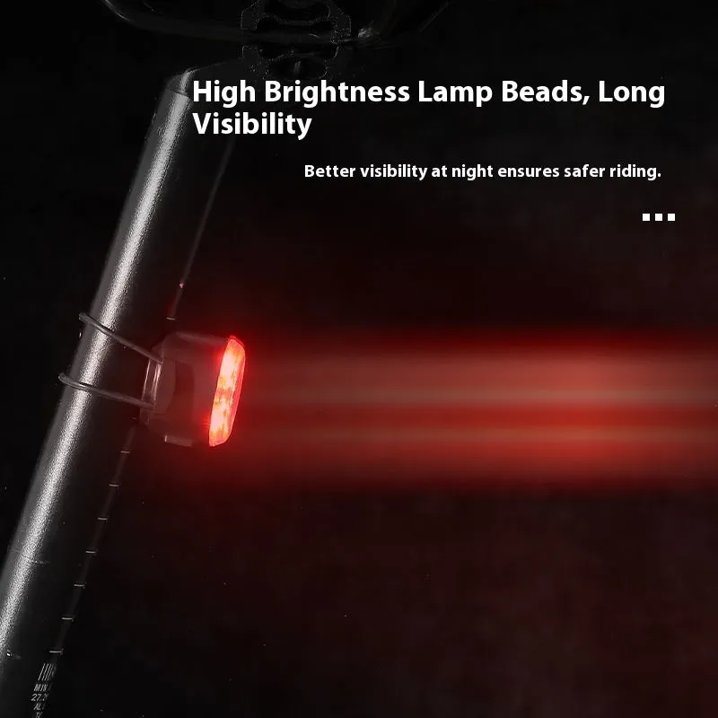 Round red bike warning light with silicone straps and USB cable for night riding