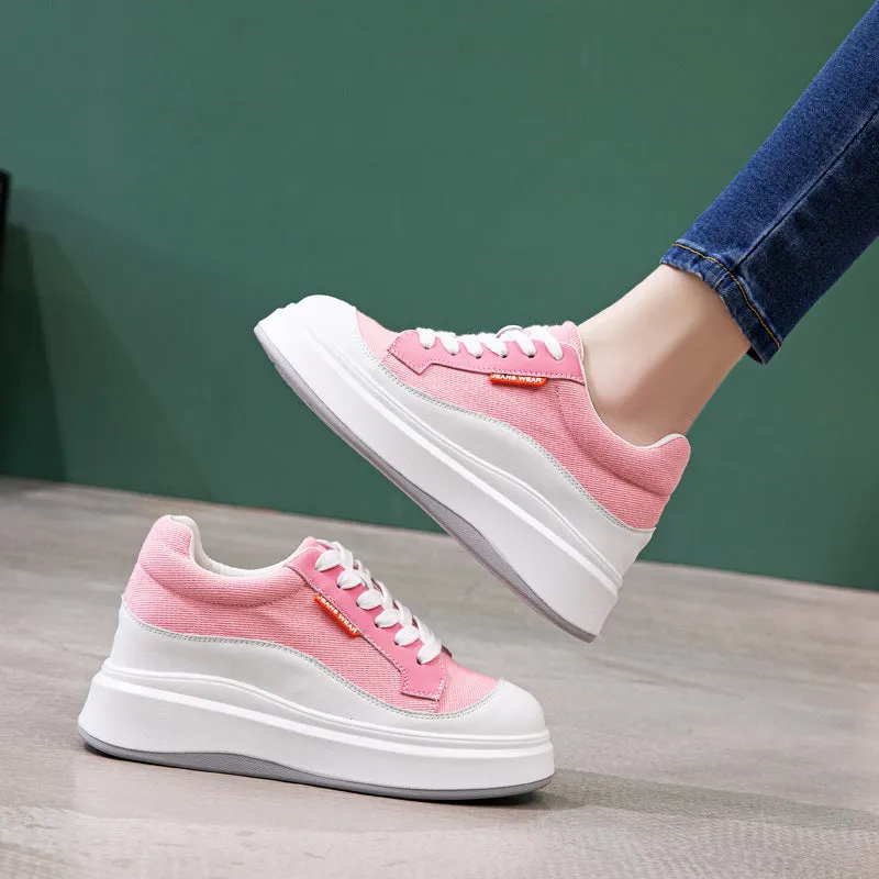 Women's beige and pink leather board shoes with thick soles showing cowhide uppers