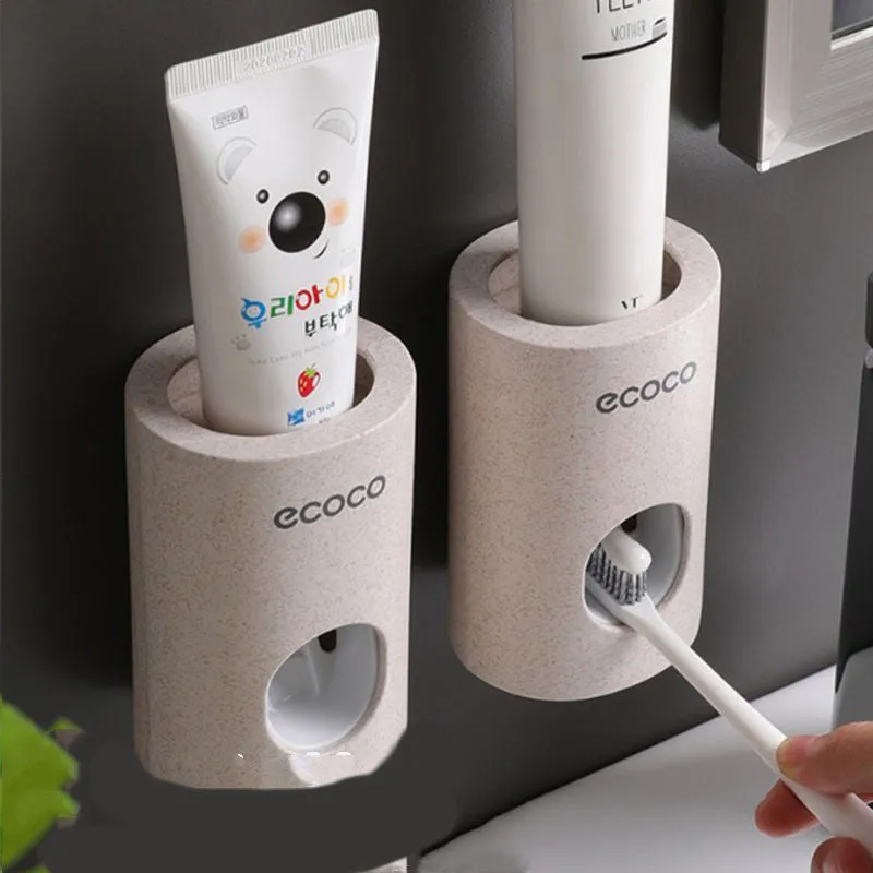 Two Ecoco single toothpaste dispensers in simple modern style, 15-18cm, on a bathroom countertop