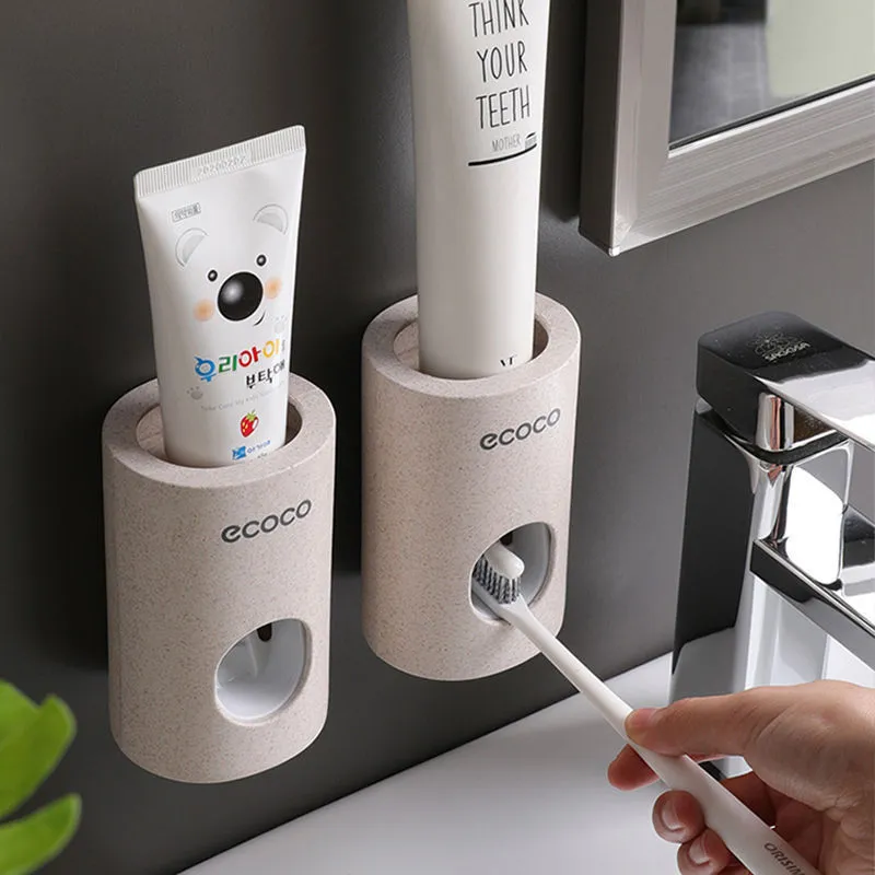 Two Ecoco single toothpaste dispensers in simple modern style, 15-18cm, on a bathroom countertop