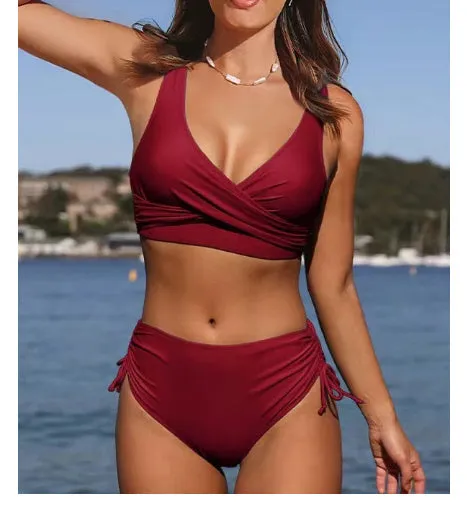 Women's solid colour swimwear bikini with cross strap design on black background