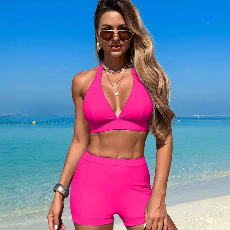 Women's black nylon bikini swimsuit on a hanger with other colour options shown.