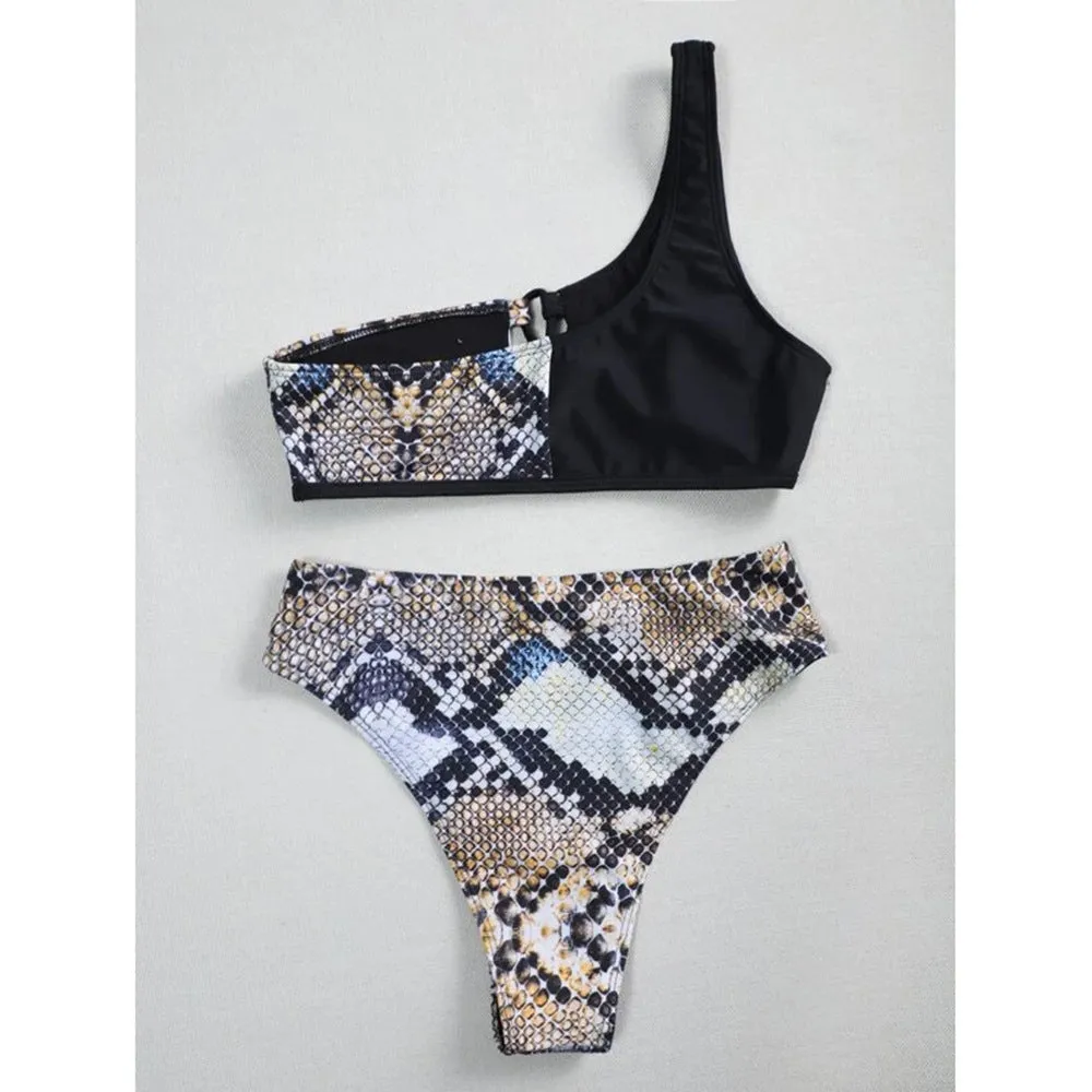 Ladies one shoulder leopard print split swimsuit with removable chest pad, side view on model