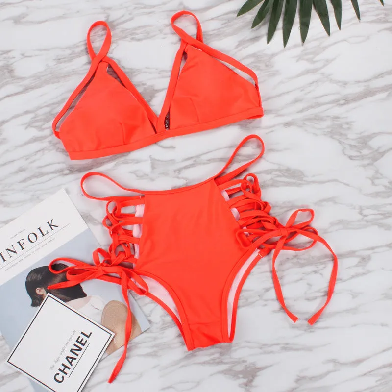 Sexy strap bikini split swimsuit in polyester fibre, available in multiple colours and Asian sizes