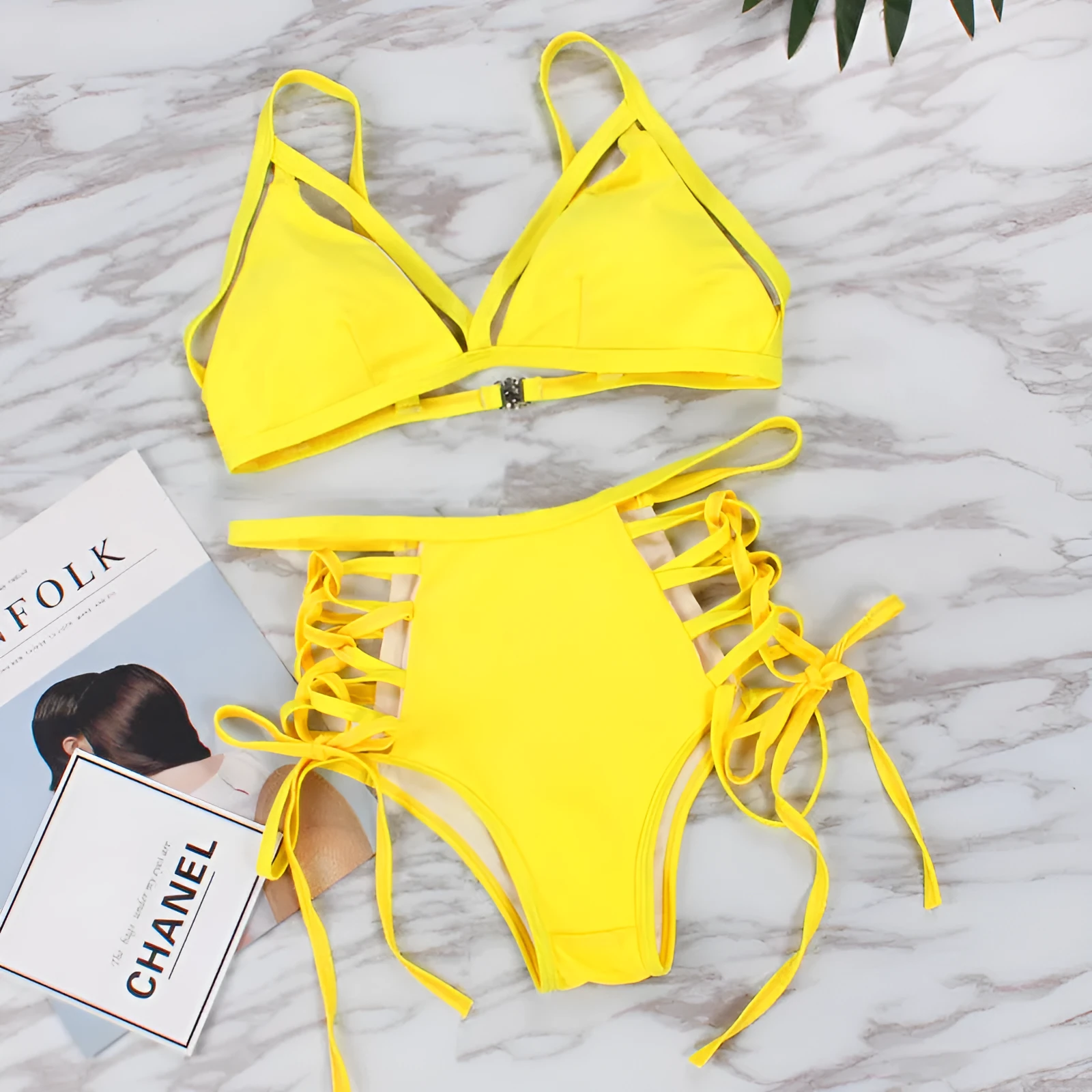 Sexy strap bikini split swimsuit in polyester fibre, available in multiple colours and Asian sizes