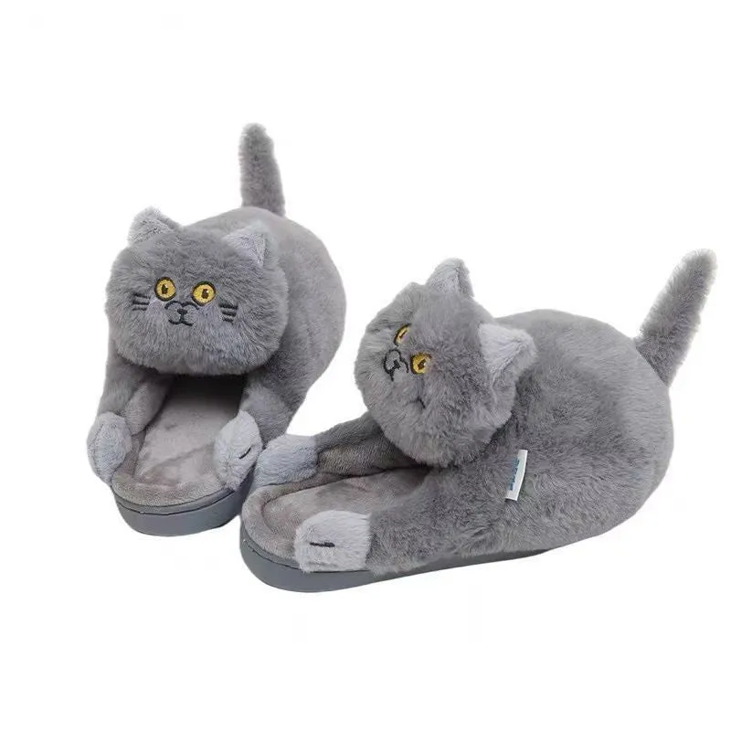 Pair of beige cat hug plush cotton slippers with non-slip sole on a soft floor