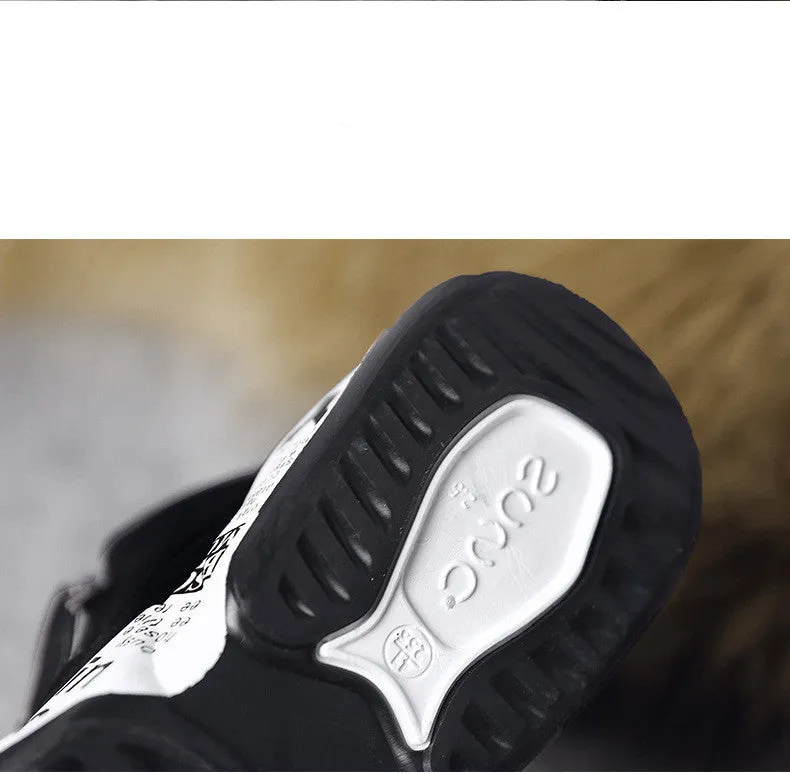 High-top snow boots with fleece lining, suede upper, and rubber platform sole in 2280 black and white