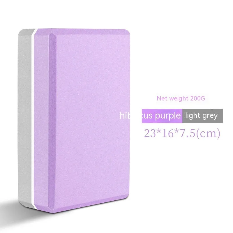 High-density EVA yoga and dance block in violet colour on a plain background