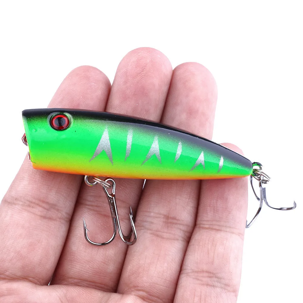 Five colourful 7cm ABS plastic freshwater fishing lures with 6# hooks on display