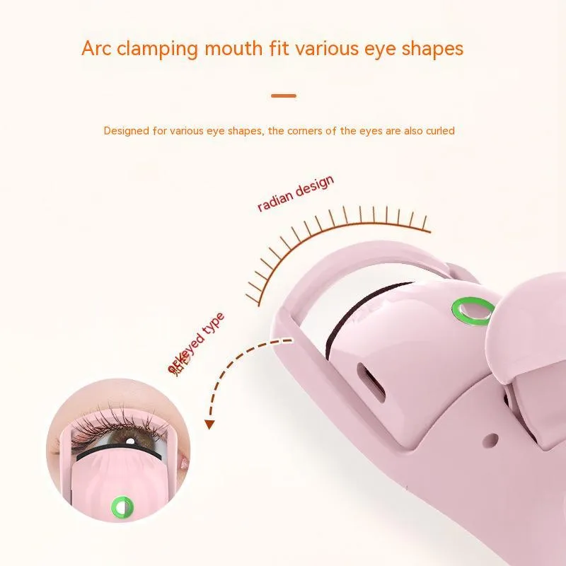Electric eyelash curler with three-speed temperature control, plastic body and silicone pad, USB charging, available in pink or white