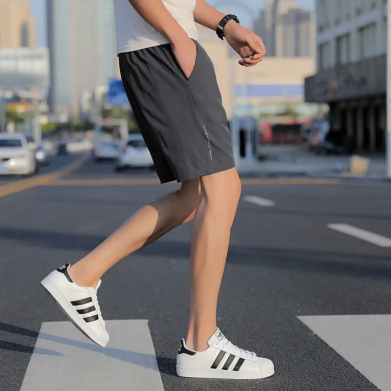 Men's quick-dry cotton five-point sports shorts in grey, black, and blue with elastic waist and drawstring, sizes L to 10XL