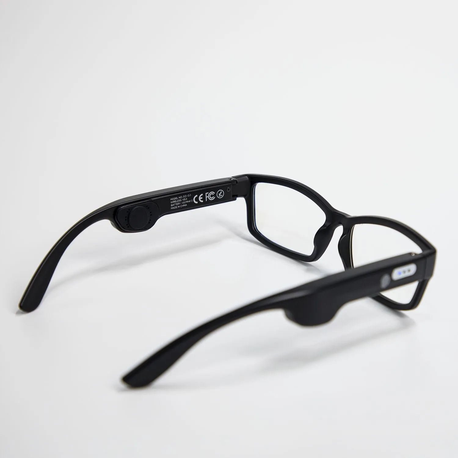 Smart Bluetooth sunglasses with red frame and black lens, touch control, and stereo loudspeaker for outdoor use