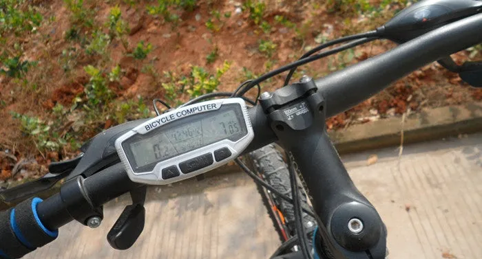 SD-558A mountain bike speedometer with blue luminous display showing speed and distance on black background
