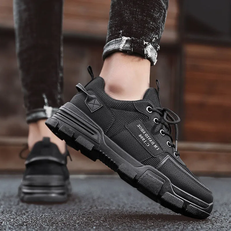 Breathable mesh sports shoes in black with lace-up closure and rubber sole, flat heel, hollow pattern upper