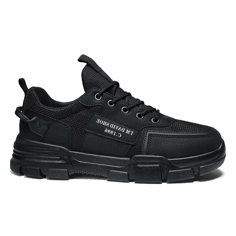 Breathable mesh sports shoes in black with lace-up closure and rubber sole, flat heel, hollow pattern upper