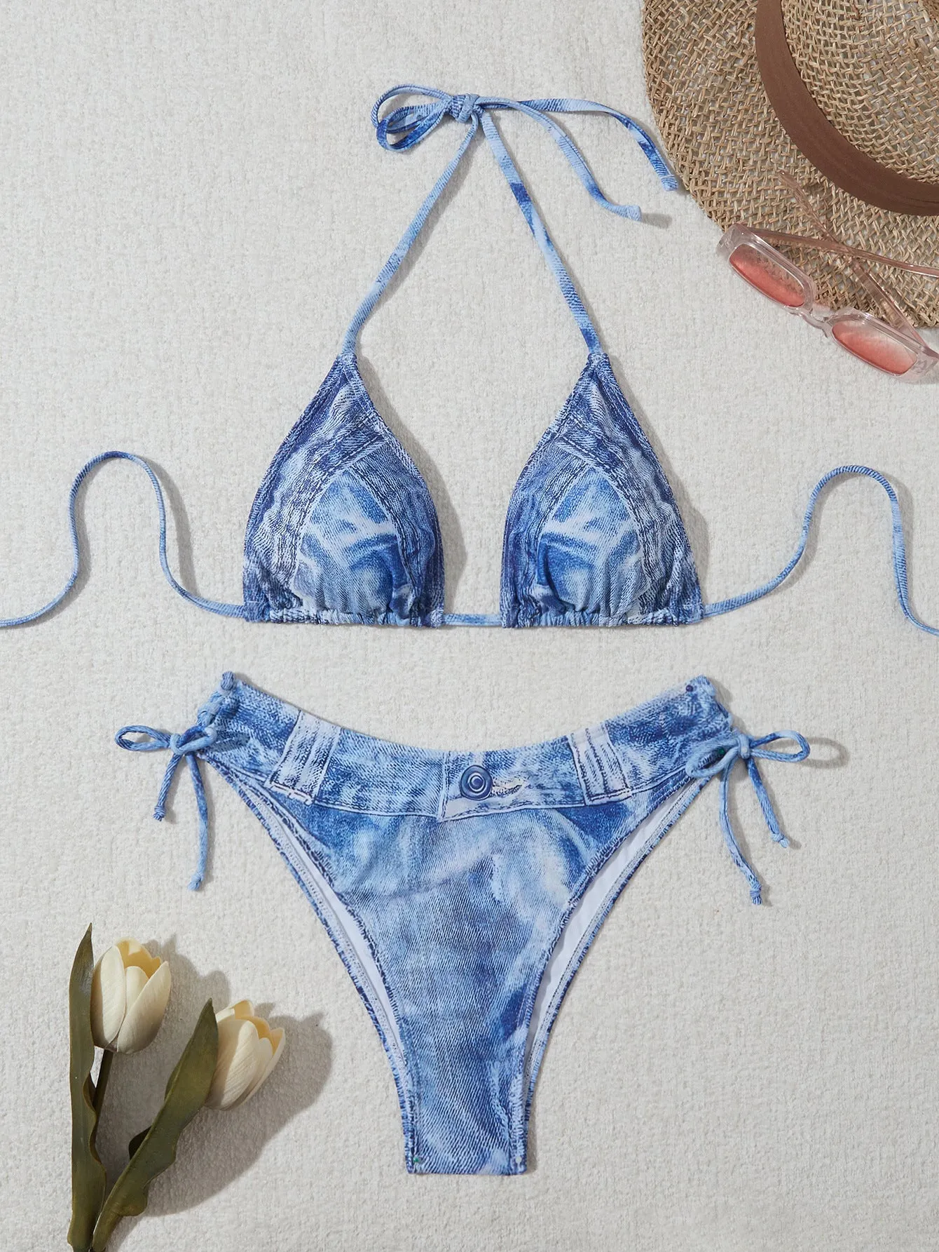 Denim blue printed women's bikini set with adjustable straps on the top.