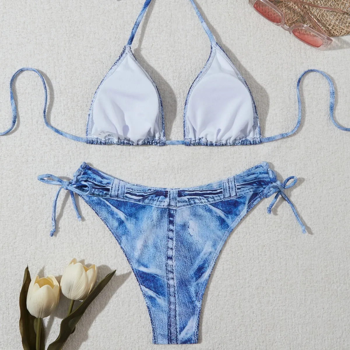 Denim blue printed women's bikini set with adjustable straps on the top.