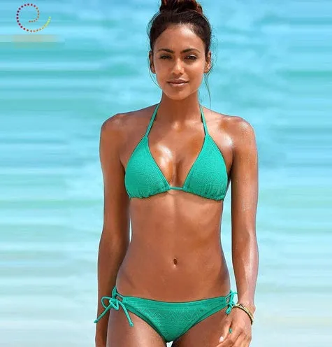 Women's solid colour polyester hollow split bikini swimsuit with chest pad in [colour] for swimming wading