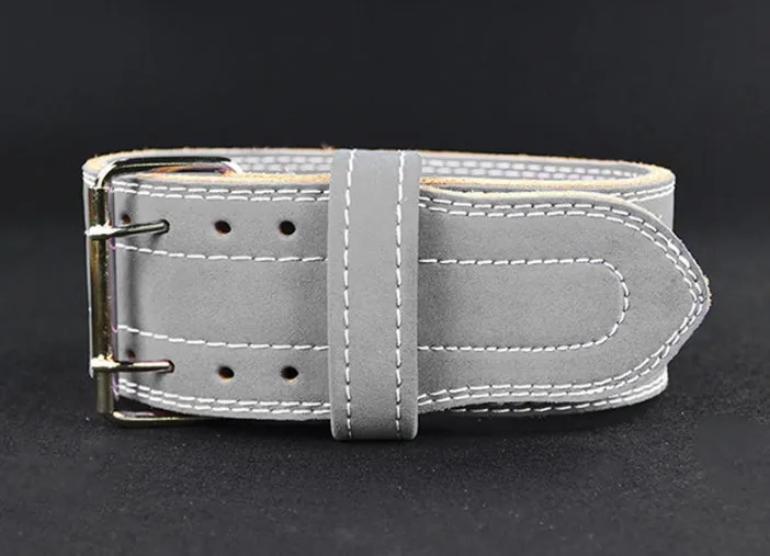 Sports belt fitness belt four-layer cowhide belt in black with adjustable buckle on a plain background