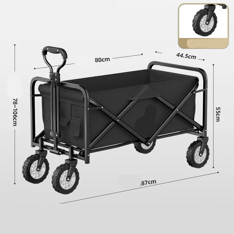 Foldable camping cart in black with 600kg capacity and push-pull handle on grass