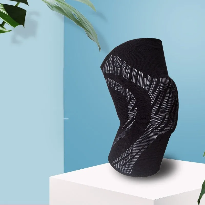 Men's black pressurised basketball knee pad made of nylon, shown on a knee.