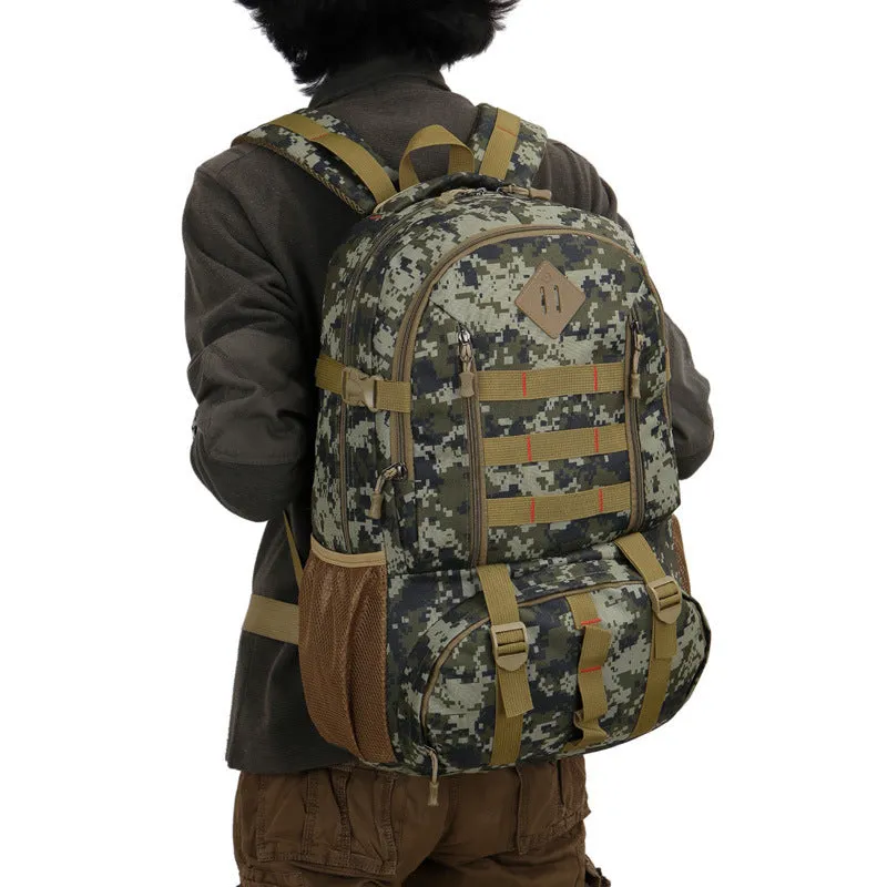 50L camouflage outdoor mountaineering backpack with Oxford cloth construction on rocky terrain