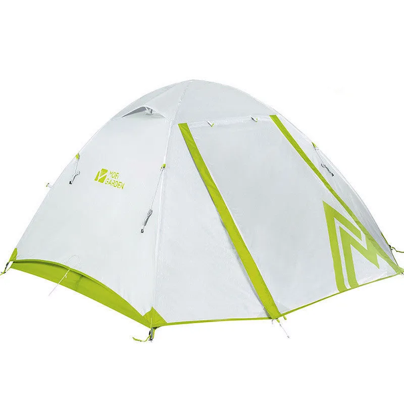 Double deck aluminum alloy camping tent in green, pitched outdoors with flysheet and aluminium poles visible