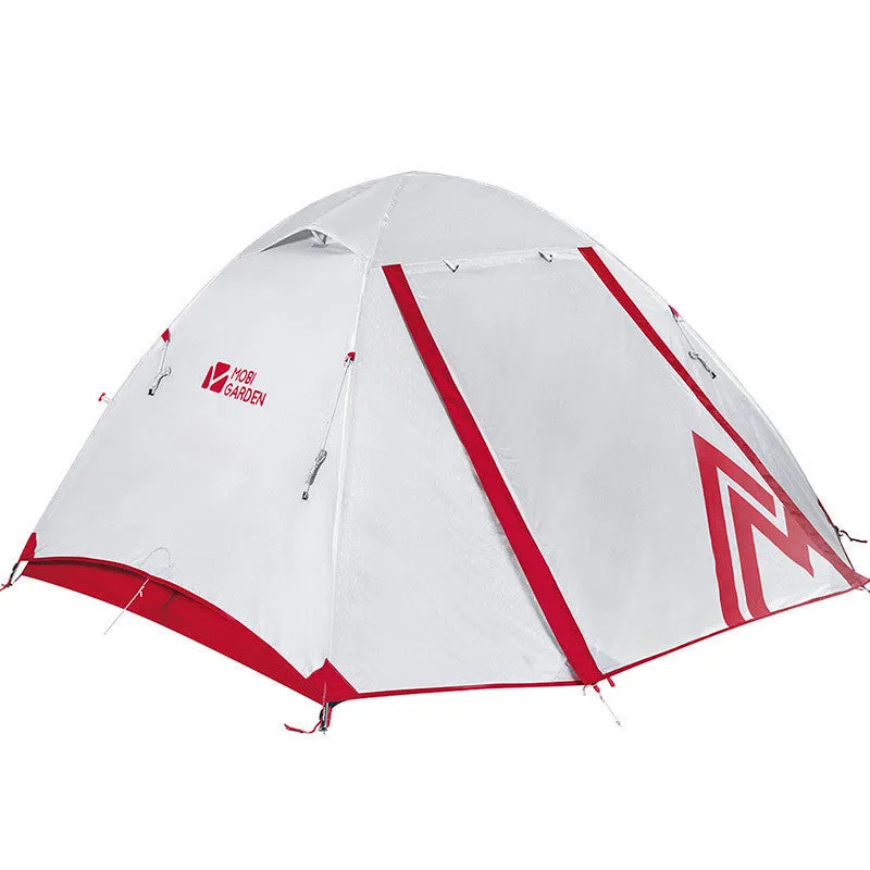 Double deck aluminum alloy camping tent in green, pitched outdoors with flysheet and aluminium poles visible