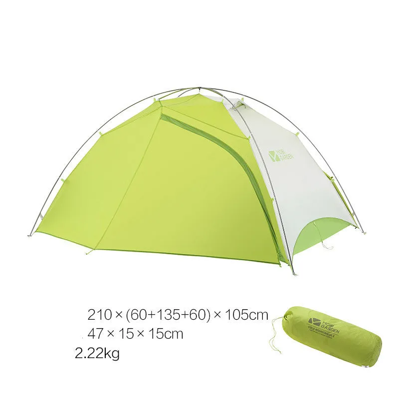 Double deck aluminum alloy camping tent in green, pitched outdoors with flysheet and aluminium poles visible