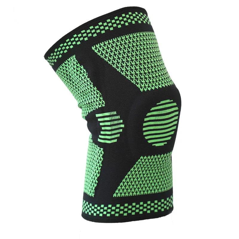 Blue sports knee pad with a visible silicone spring circle on a polyamide sleeve.