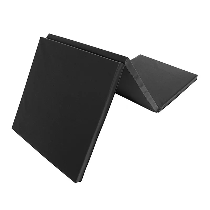 Tri fold sports gym mat in black, 180x60x4cm PU soft sponge, folded and laid flat on floor