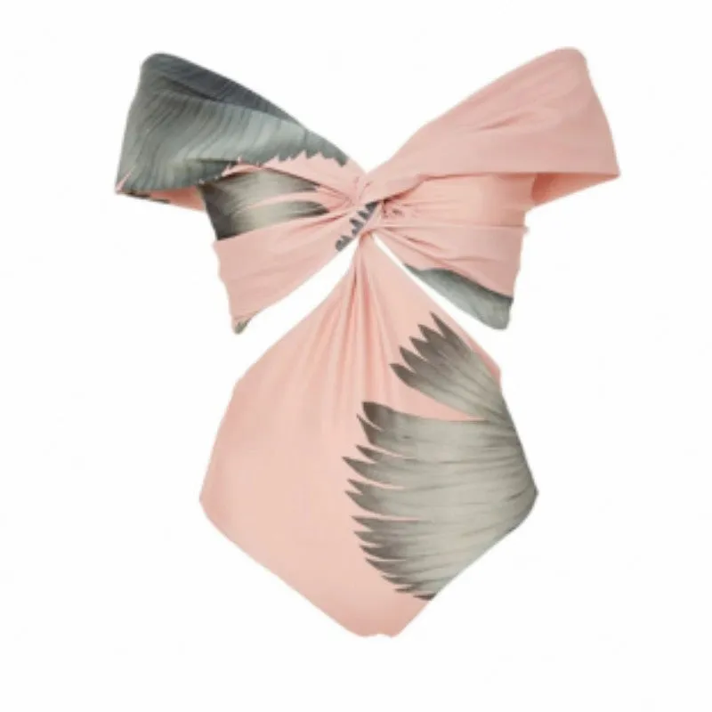 Women's vintage holiday pink polyester bikini suit with matching skirt for swimming and wading