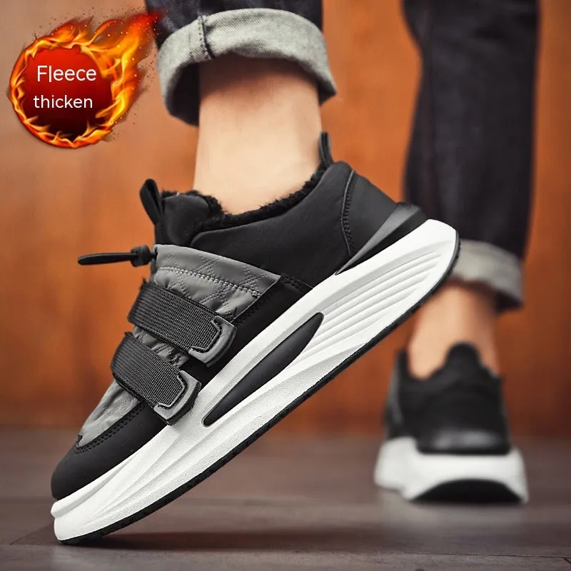 Men's black and gray striped lace-up platform sneakers with cotton upper and PVC sole on display