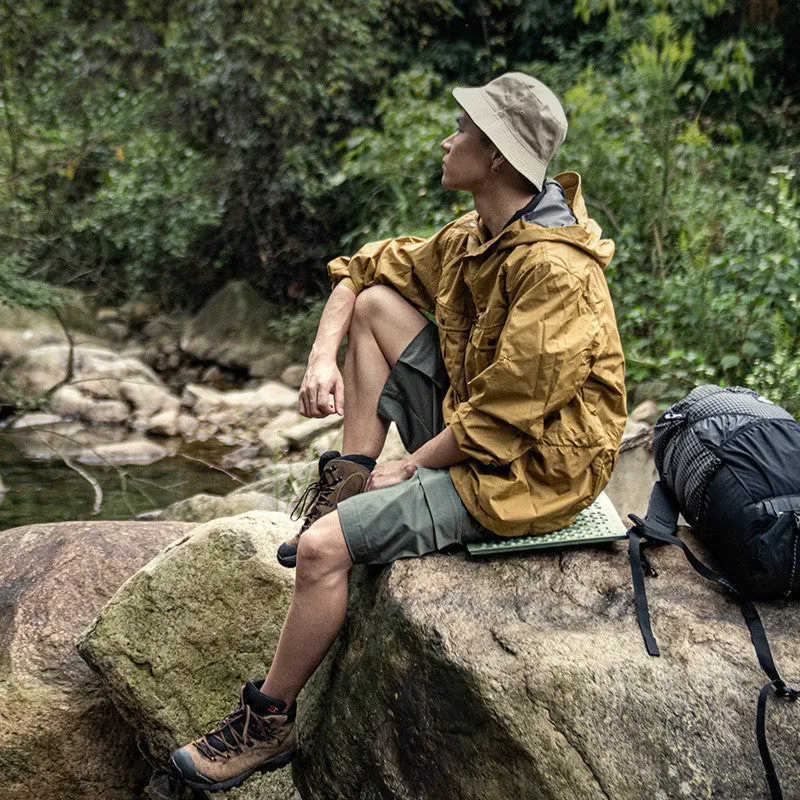 Folding moisture-proof outdoor camping mat in khaki, compact design for single person use