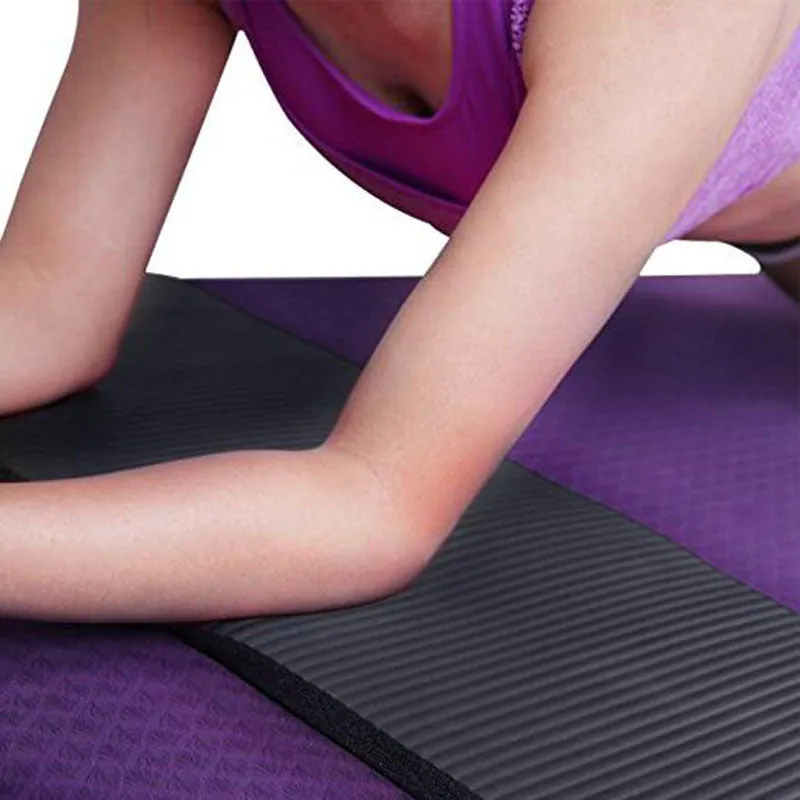 15mm thick EVA NBR yoga mat in black, blue, and purple colour options, 60x25x1.5cm, on a wooden floor
