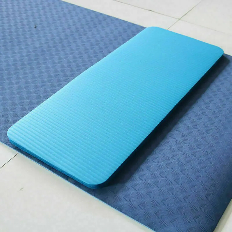 15mm thick EVA NBR yoga mat in black, blue, and purple colour options, 60x25x1.5cm, on a wooden floor