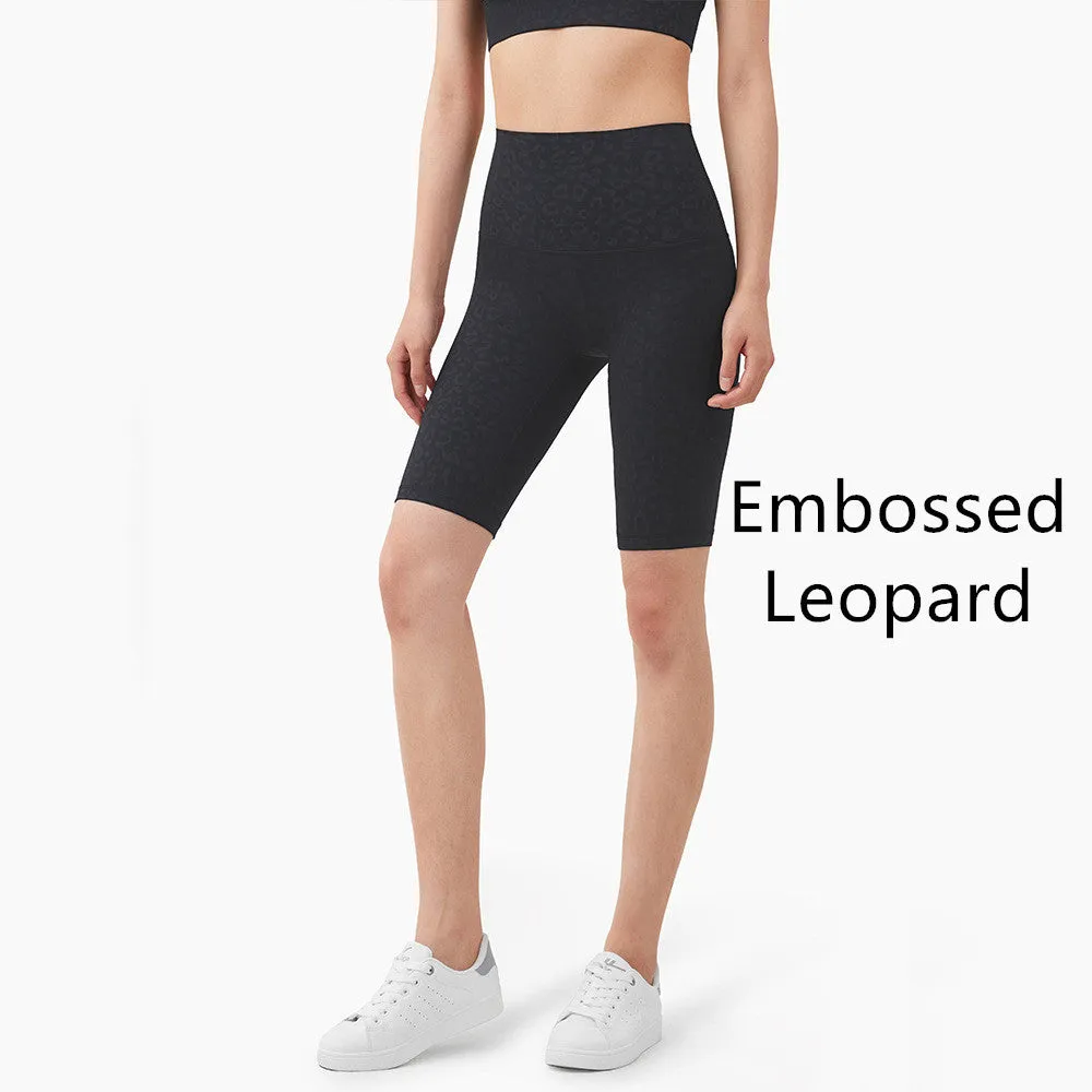 Women's five-point fitness pants in moisture-wicking nylon, available in multiple colours