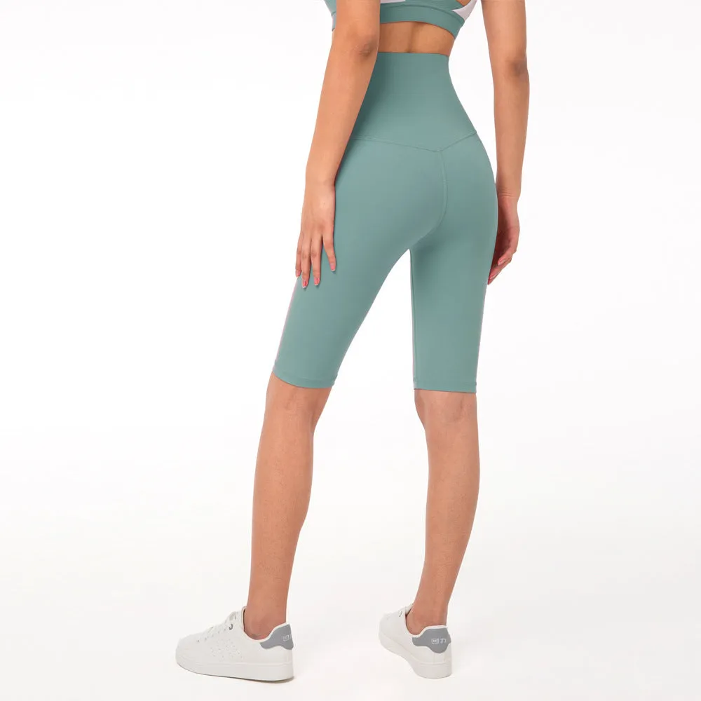 Women's five-point fitness pants in moisture-wicking nylon, available in multiple colours