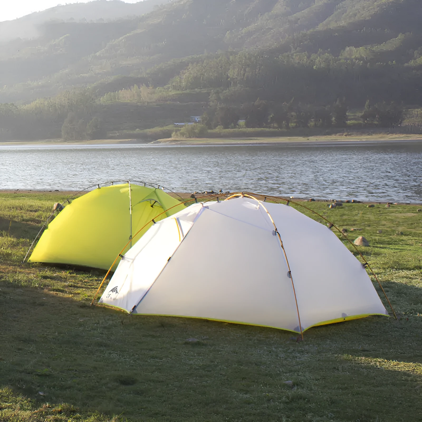 Green camouflage double layer camping tent with two room one hall layout set up outdoors