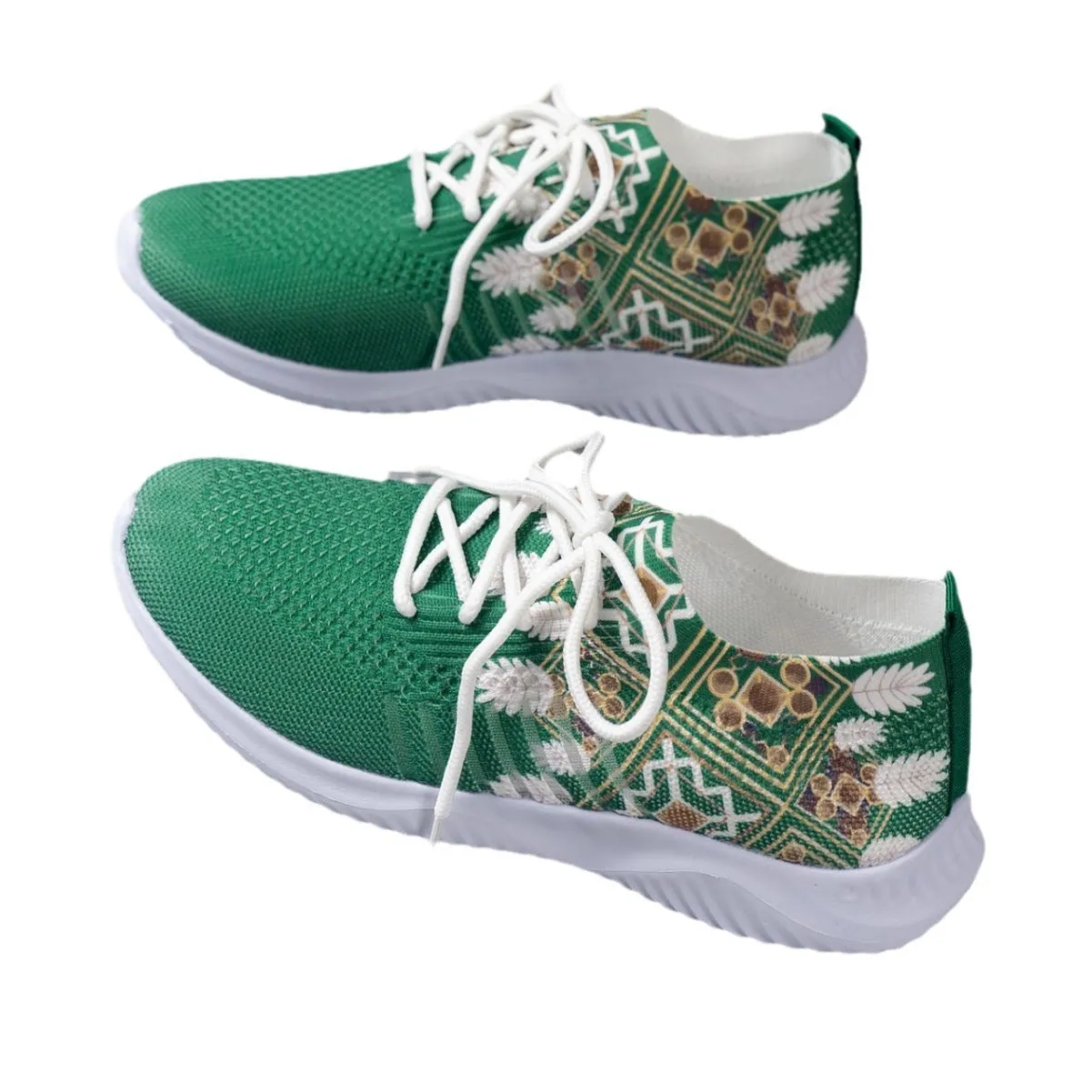 Women's woven flat shoes in green with printed totem detail, mesh upper, rubber sole, and front lace-up closure