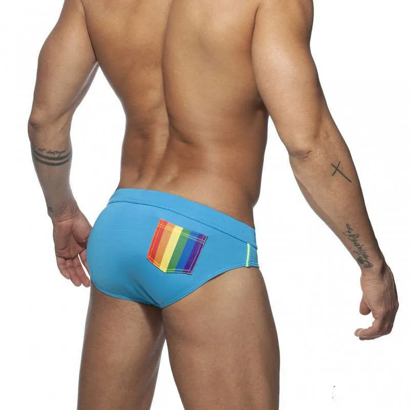 Rainbow low-waisted men swim briefs with front pocket in vinylon fabric, blue colour