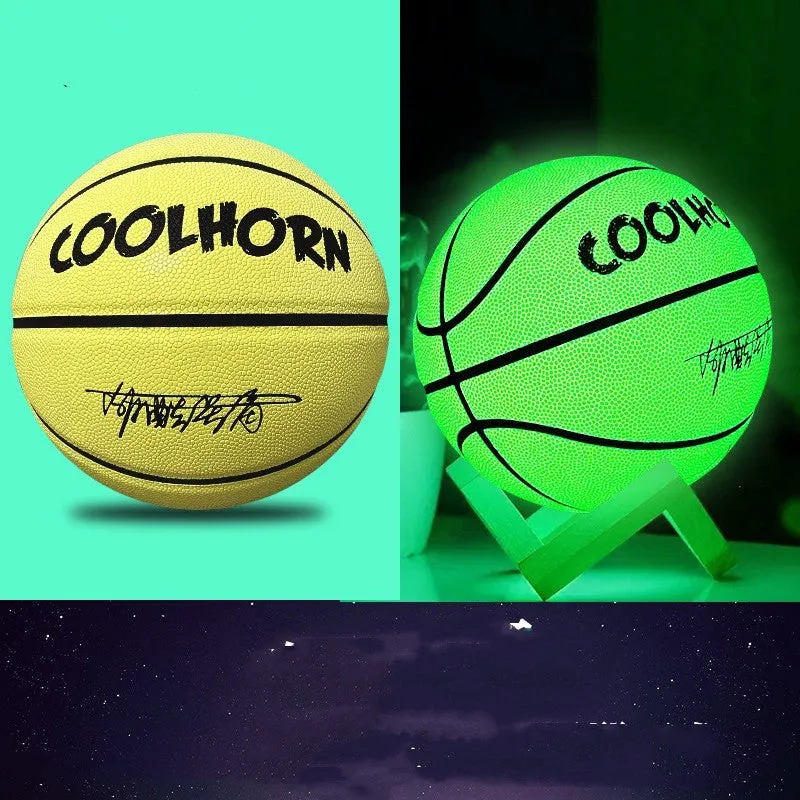Luminous outdoor basketball with soft PU leather cover in glowing blue colour on outdoor court