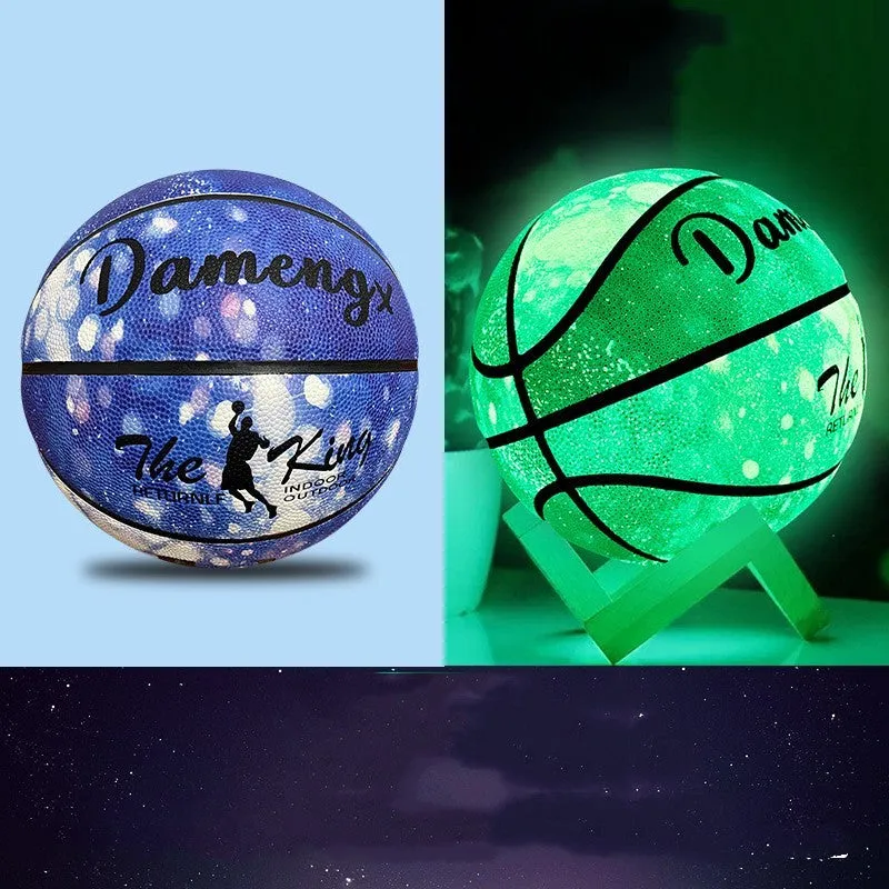Luminous outdoor basketball with soft PU leather cover in glowing blue colour on outdoor court