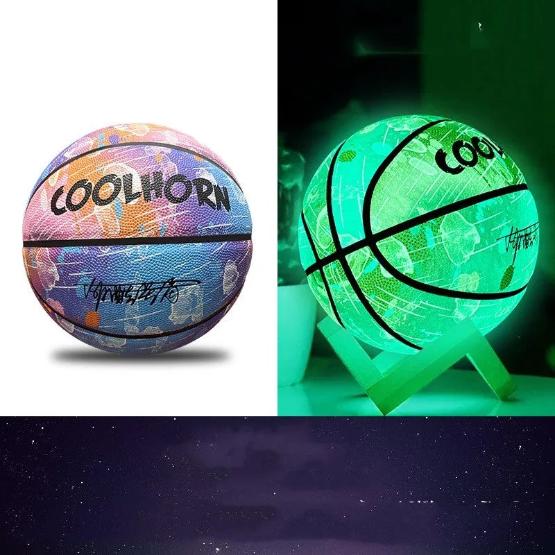 Luminous outdoor basketball with soft PU leather cover in glowing blue colour on outdoor court