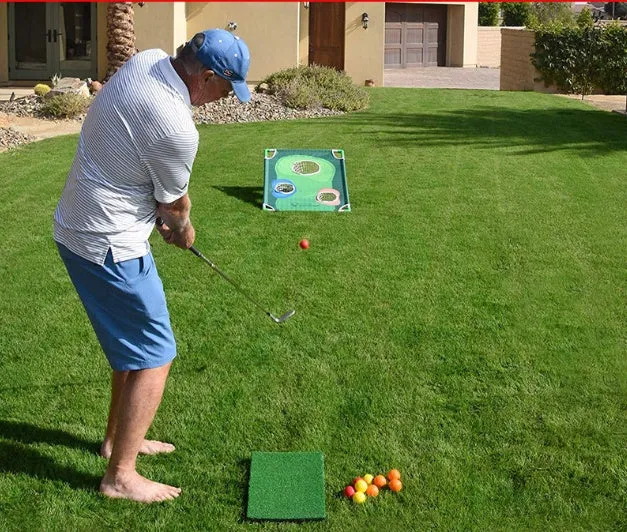 Green 90x60cm golf swing practice net with PVC frame and oxford cloth cover on grass, with straw mat and balls