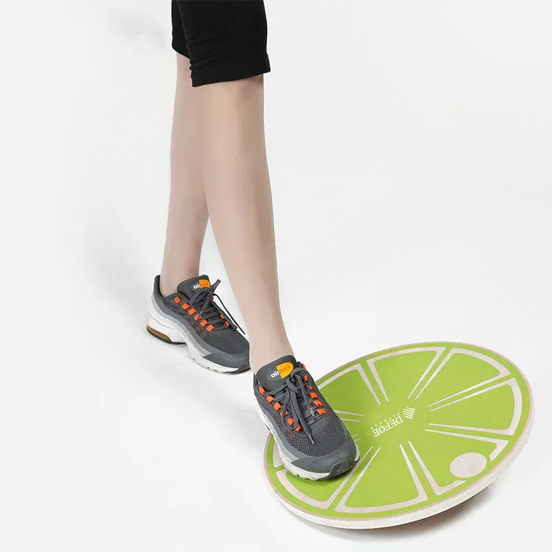 Anti-skid balance board wooden wobble board 39.5cm diameter light green colour on floor