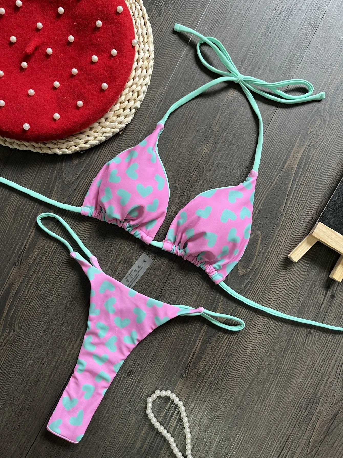 Heart-printed backless swimsuit with split design in quick-drying nylon fabric