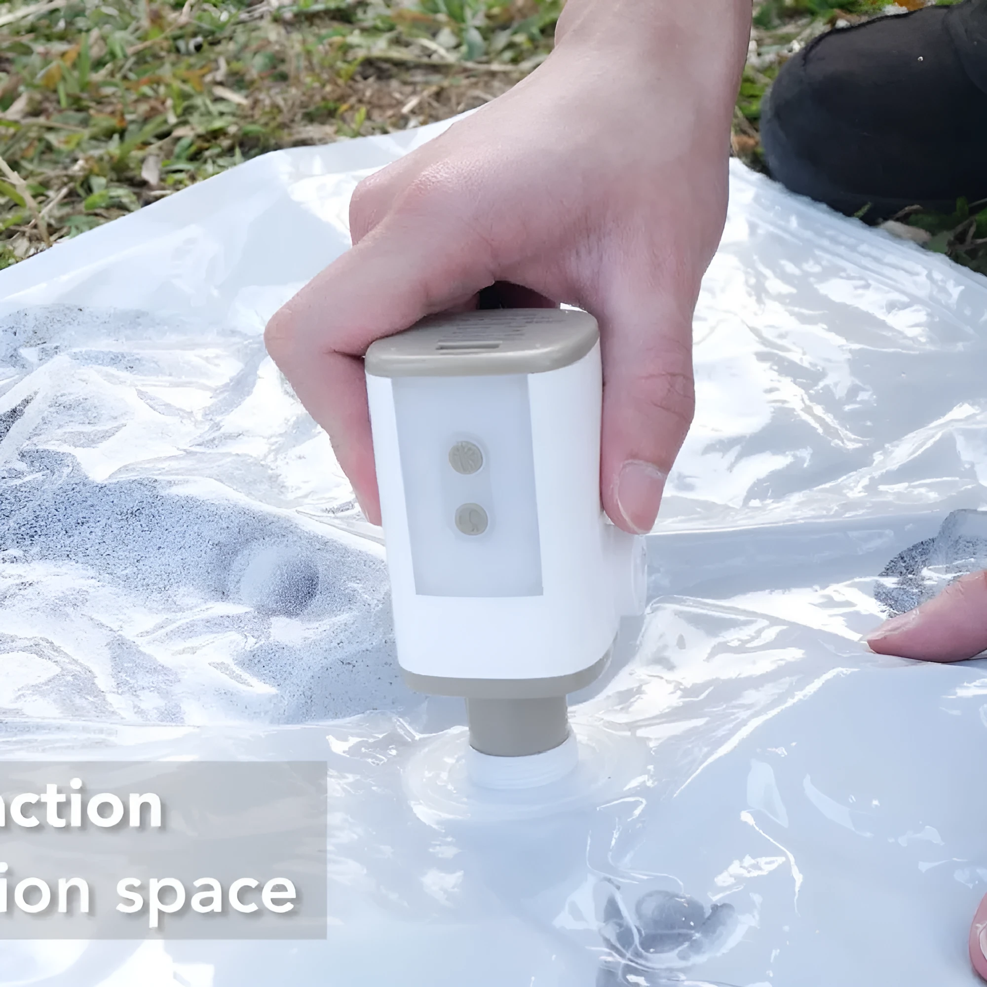 Outdoor camping portable mini motor pump in Khaki White USB with nozzles and lanyard on a blue background
