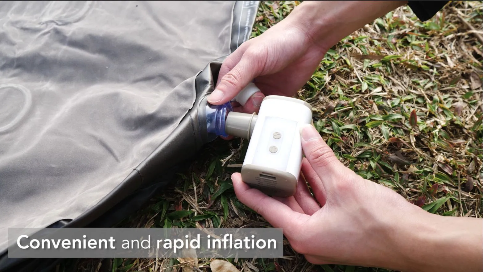 Outdoor camping portable mini motor pump in Khaki White USB with nozzles and lanyard on a blue background