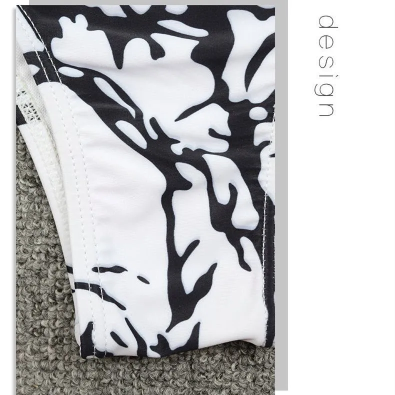 Black and white tie dye two-piece bikini set with chest pad and tied details on the top